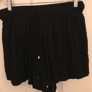Black skort. Size Large. Looks like skirt when on